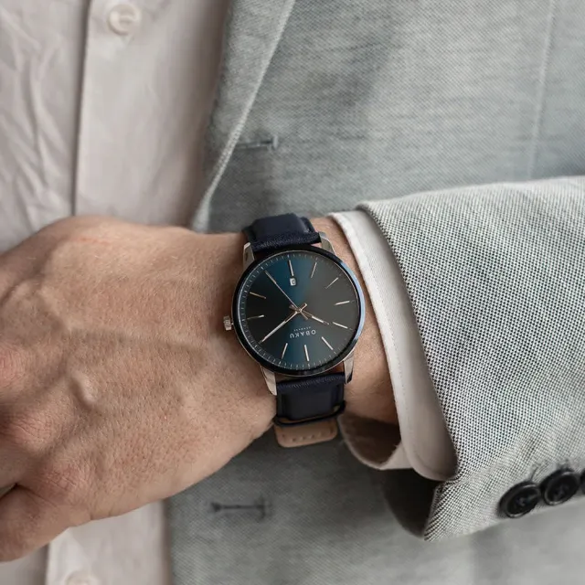 【OBAKU】簡約美學紳士皮革時尚腕錶-銀X藍(V270GDHLRL)