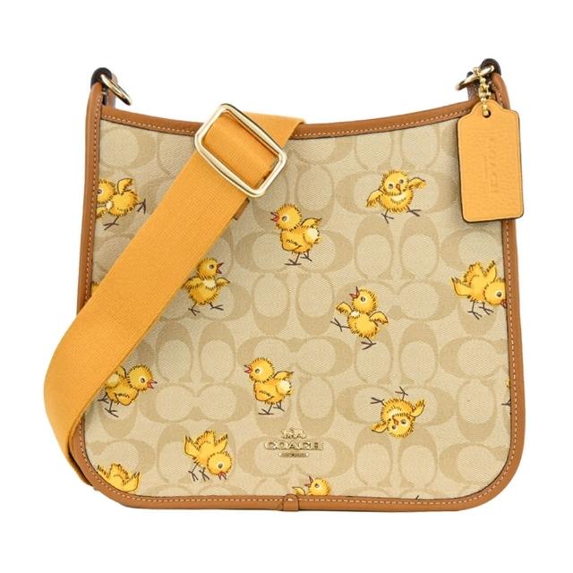 【COACH】Dempsey 小雞logo印花PVC斜背包(焦糖棕黃)