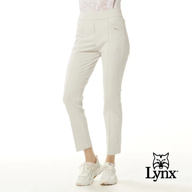 【Lynx Golf】女款日本進口布料吸汗速乾抗UV功能寬腰頭設計造型剪裁九分窄管長褲(二色)