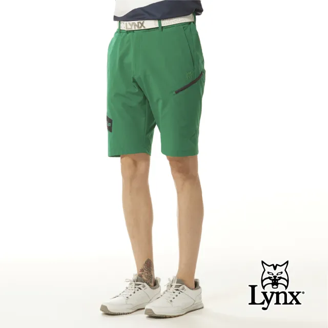 【Lynx Golf】首爾高桿風格！男款彈性舒適LOGO字樣配布剪接側邊拉鏈口袋設計平口休閒短褲(二色)