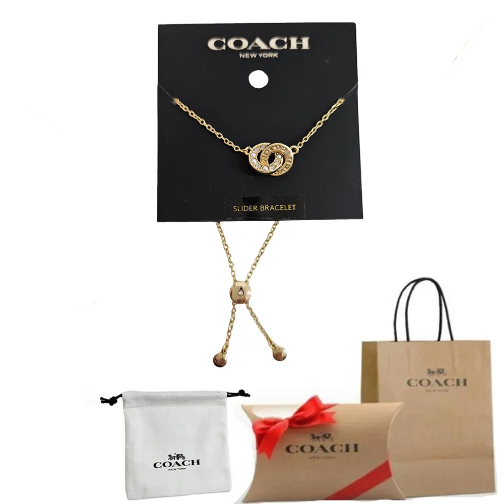 COACH】coach 新款珍珠水鑽雙扣環手鏈套組金色贈原廠防塵袋紙袋- momo