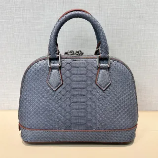 西班牙DMOM珍稀蛇皮貝殼包