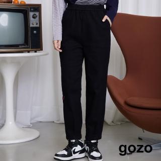 【gozo】MOMO獨家款★限量開賣 gozo織標下擺收折鬆緊長褲(黑色)
