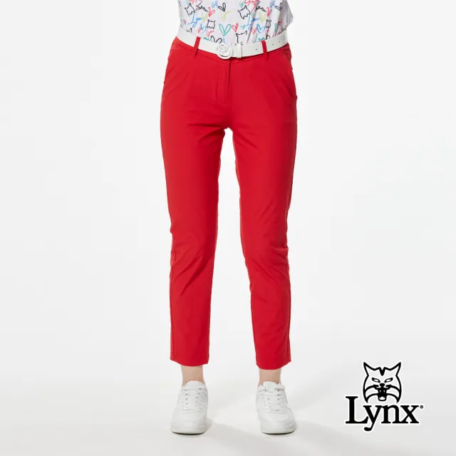 【Lynx Golf】女款彈性舒適極簡風格LOGO壓紋織帶剪接俏皮袋蓋矽膠標造型窄管九分褲(二色)