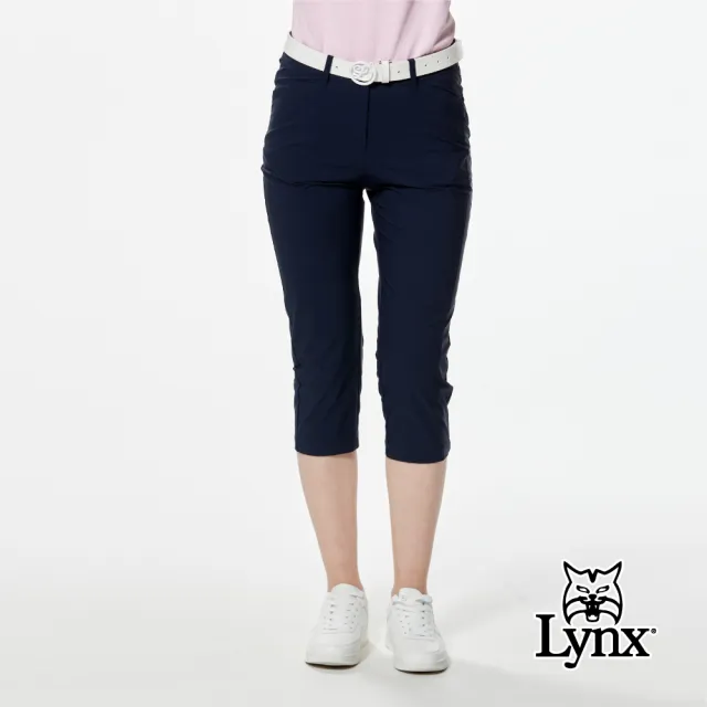 【Lynx Golf】女款彈性舒適後腰鬆緊帶設計經典山貓貓頭貼膜造型窄管七分褲(二色)