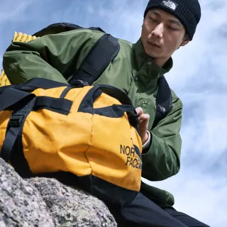 【The North Face 官方旗艦】北面男女款黃色背提兩用可收納旅行包｜52SA4WP(登山包)