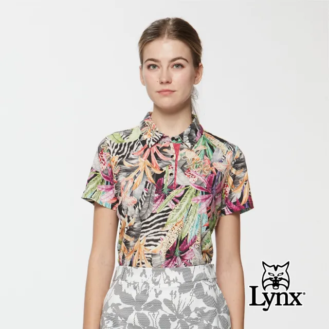 【Lynx Golf】女款歐洲進口布料熱帶花卉印花下擺開杈短袖POLO衫/高爾夫球衫(黑色)