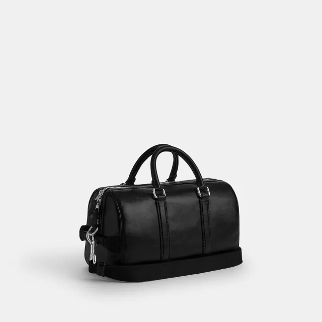 【COACH】蔻馳官方直營 VENTURER 27 掛件裝飾行李袋 旅行袋 斜背包-SV/黑色(CDY54)