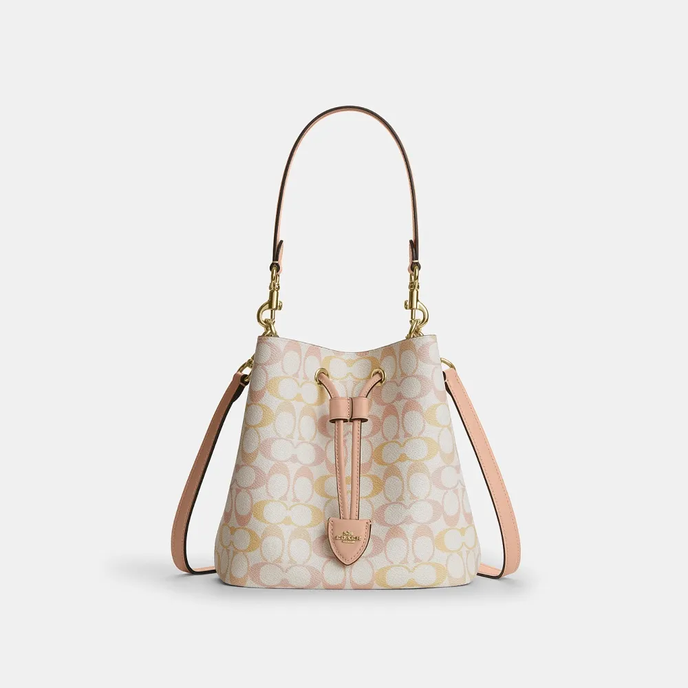 【COACH】蔻馳官方直營 精美經典標誌ROWAN水桶包-IM/粉筆白色/粉色(CEL14)