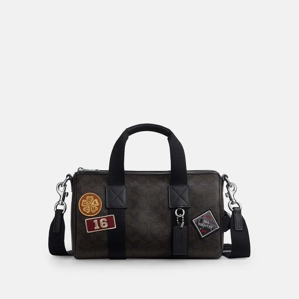 【COACH】蔻馳官方直營 EXPLORER 28 經典 SIGNATURE 貼飾行李袋 旅行袋 斜背包-SV/核桃棕色/黑色(CGA26)